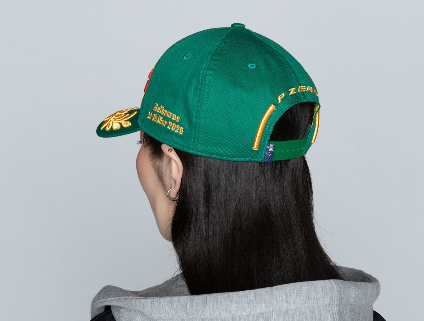 Pirelli cap green woman back