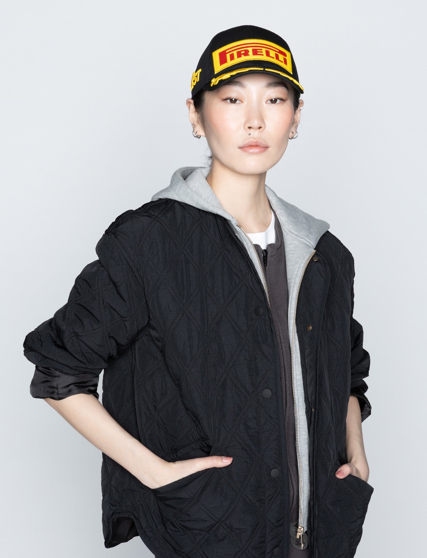 Pirelli black cap on woman